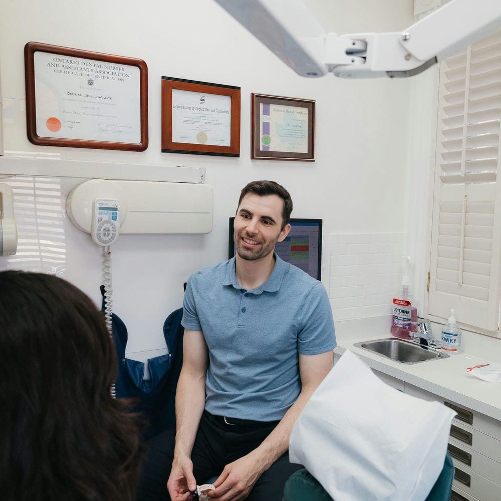 Markham dentist showing a patient the custom oral appliance used to treat snoring